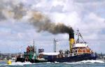 ID 4449 WILLIAM C. DALDY (1935/348grt/IMO 5390345) - seen here during the 168th Auckland Anniversary Day Regatta tug race bearing down on KAITOA of the Total Marine Services Ltd fleet of green and black tugs...